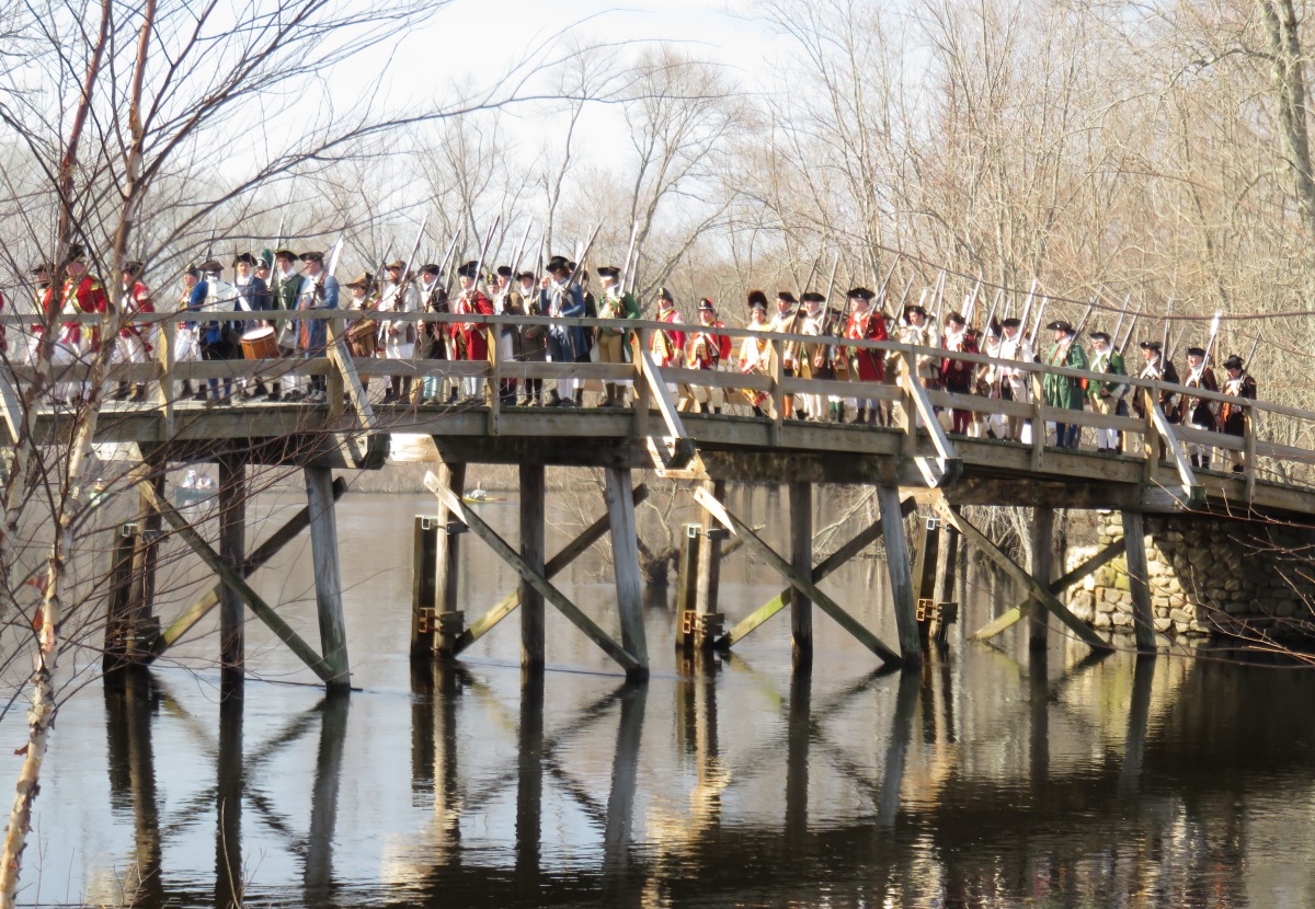 Minutemen marching over Old North Bridge, Concord, Massachusetts
